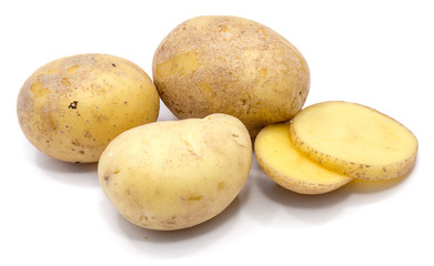 Three whole potatoes and two slices isolated on white background.