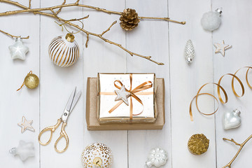 Christmas, New Year white wooden flat lay frame with a gift. Winter holiday concept composition. 