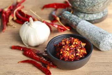 Fotobehang chili paste with garlic © oilslo