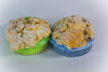 muffin with sprinkles, white background