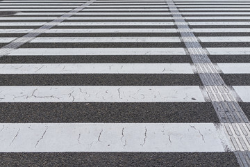 zebra crossing pattern line on grunge street cracked surface of urban safety city in Nagoya Japan