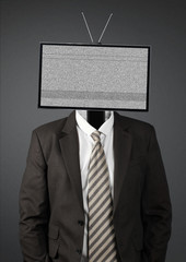 businessman with rmpty tv head on dark background