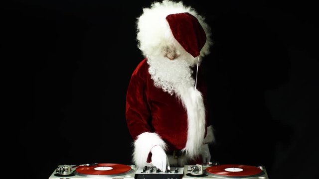 father christmas dancing at a disco party