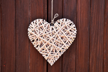 wood heart on the wood door (Valentine's day)