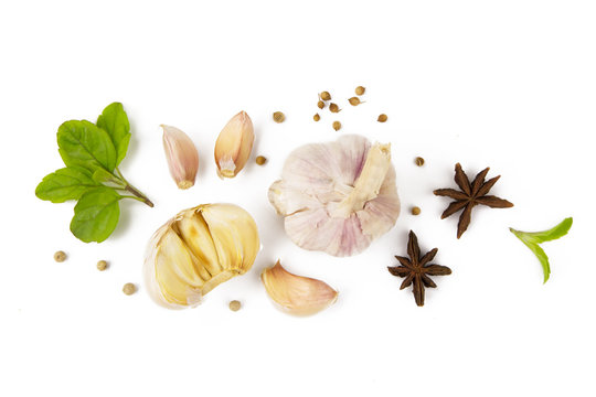 Food spice and garlic with leaves isolated white background