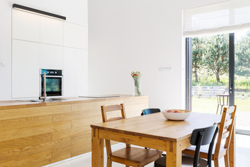 Dining table in bright white interior