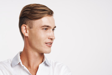 profile of a young man with blond hair