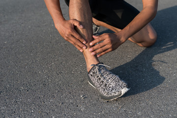 young sport man shin  injury from running