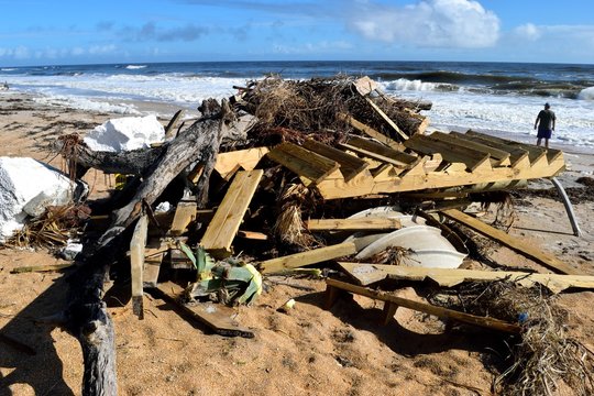 Debris on the beach after hurricane Irma hitting on the east coast of Florida on September 11, 2017