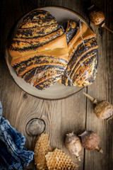 Sweet buns with poppy seed and frosting.