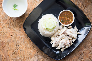 Hainanese chicken rice with soup and sauce