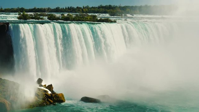 Stream the water of Niagara Falls. American side of a waterfall in the shape of a Horseshoe. 4k 10 bit video