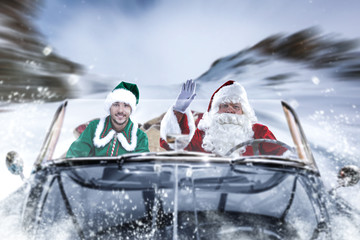 The people in the black cabriolet are hurrying for Christmas. Winter road through the mountains of...