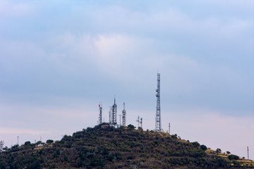 Radio relay tower on the hill over the city of Afyonkarahisar in Turkey