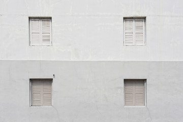 Windows with shutters on wall