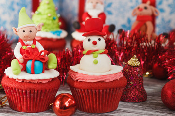 Christmas cupcakes with colored decorations