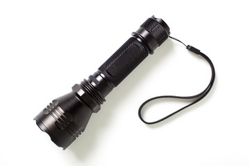 Black flashlight on white background.