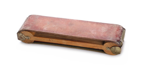 Old skin razor sharpener isolated on white background