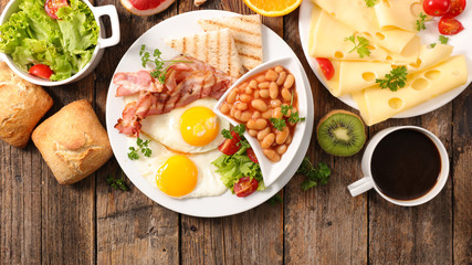 healthy breakfast with bacon,cheese,egg and fruit