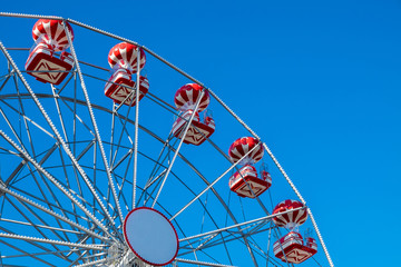Ferris wheel with clear blue sky