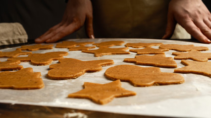 The recipe for making ginger biscuits. Cut cookie dough.