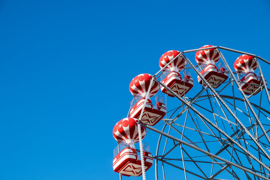 Ferris wheel with clear blue sky