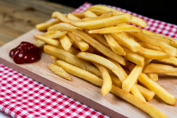 Golden French fries potatoes ready to be eaten