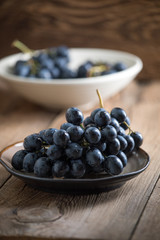 Dark grape in bowl.