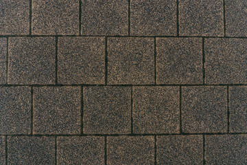 Grey brick stone street road. Light sidewalk, pavement texture. Road