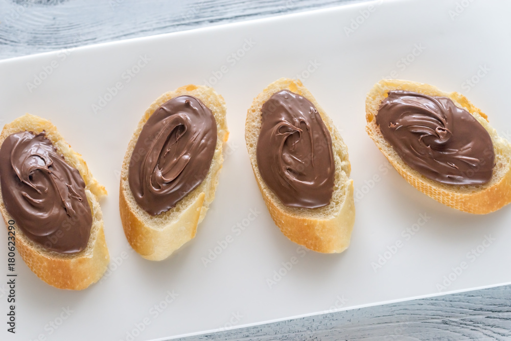 Poster slices of baguette with chocolate cream