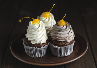 Chocolate Cupcakes with Cherry and Cream