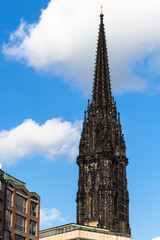 Fototapeta na wymiar steeple of St Nicholas Church in Hamburg city