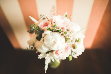 Wonderful luxury wedding bouquet of different flowers