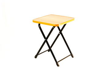 The small square stool on the white background