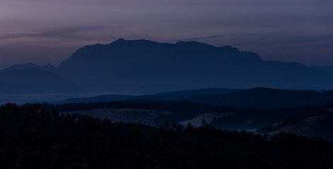 Morning light on the hills of holbav brasov romania