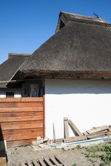 Village house with thatched roof