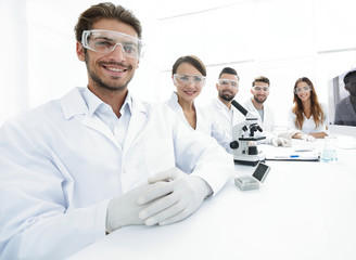 Fototapeta premium Male scientist and the team in the lab.