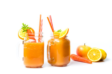 Fototapeta na wymiar Carrot smoothie in a jar isolated