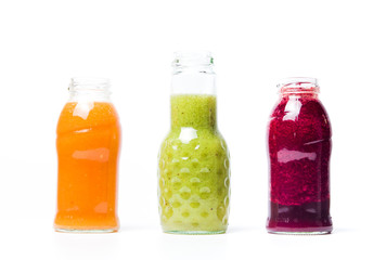 Colorful smoothies with fruits isolated