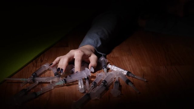 Syringe drug abuse concept