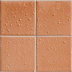 orange colored shower / bath tiles with water drops, repeatable background pattern