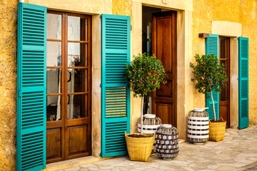 Street santanyi. Colorful facade of Mallorca. - obrazy, fototapety, plakaty