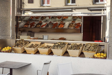 fresh oysters at street market in Nice , France