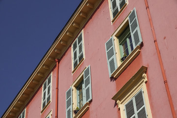 Pink building with blue sky for background