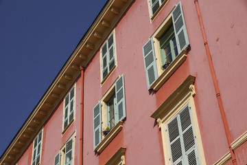Pink building with blue sky for background
