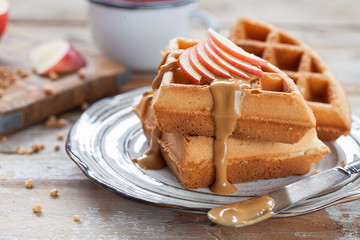 Waffles with peanut butter and apple