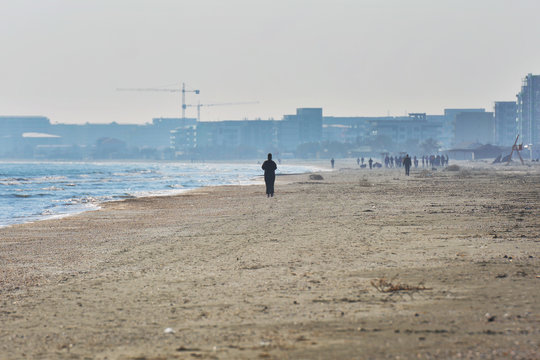 Sunny autumn morning on the shore of the Black sea at Navodari beach, Mamaia North, Romania