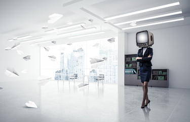 Business woman with an old TV instead of head.