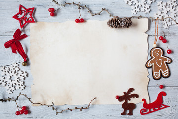 Christmas greeting, background, letter on a wooden background. Branches, cones, reindeer and...
