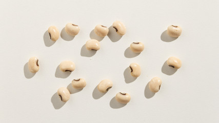 Black Eyed Pea legume. Top view of scattered grains.